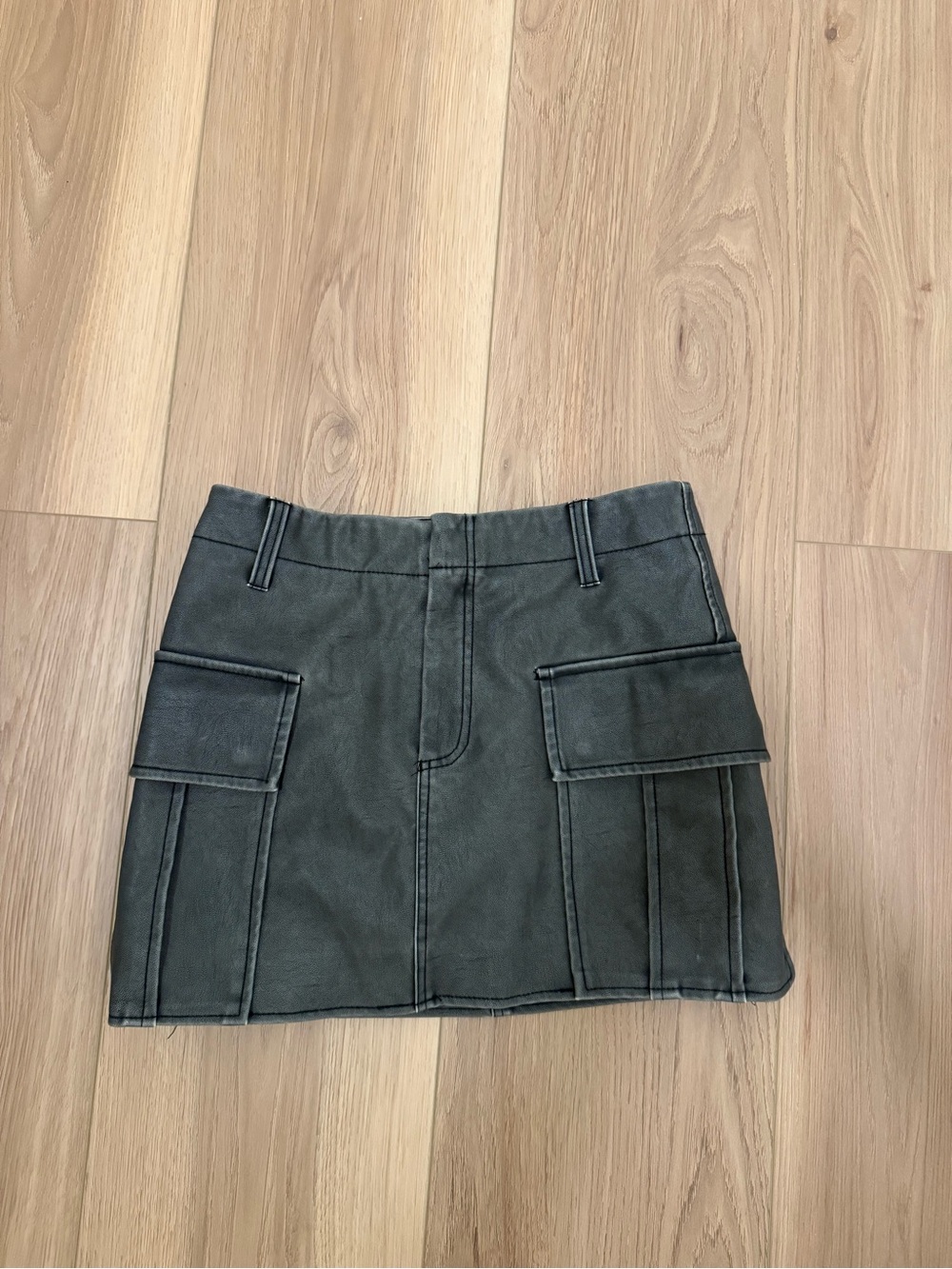 Blank NYC black/ gray cargo leather mini skirt in a size 24